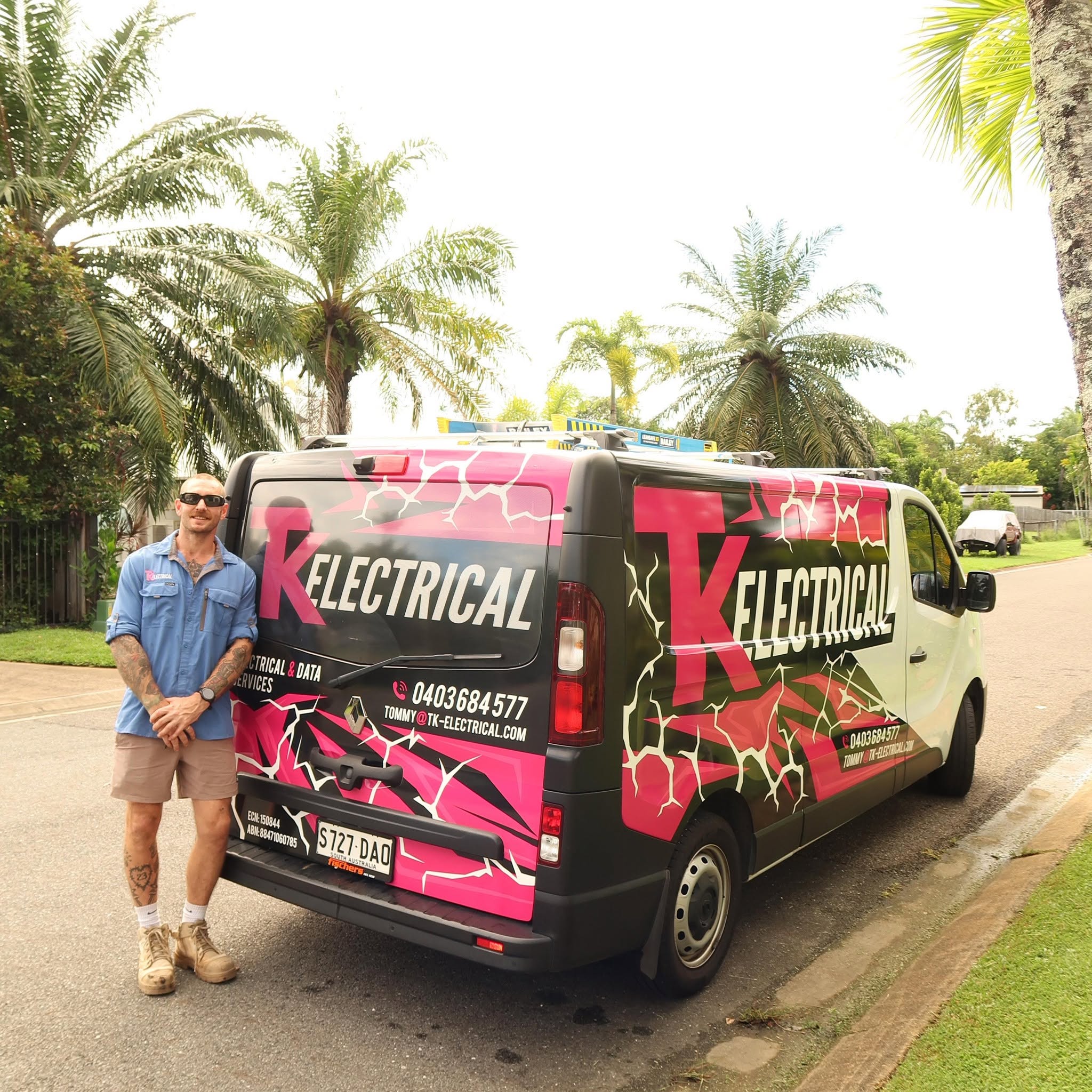 TK Electrical van and Tommy in Port Douglas